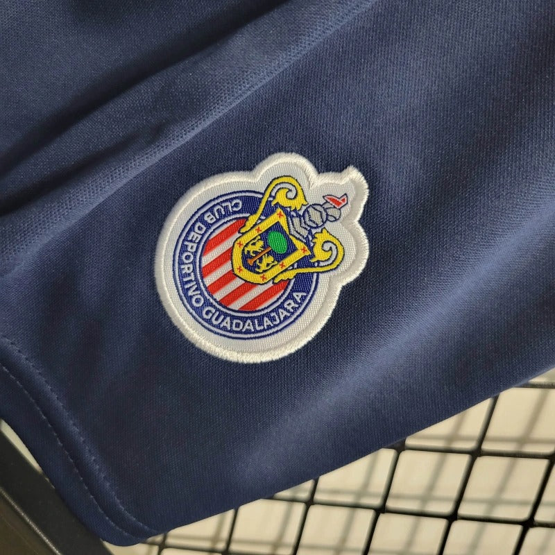 Kit niños Chivas 2023/24 Local